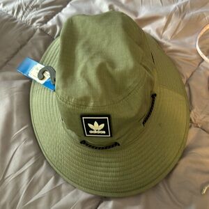 Adidas Boonie hat in light green brand new with the tickets size medium